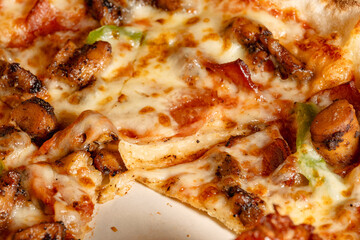 Delicious Chicken Pizza with Melted Cheese and Crispy Toppings