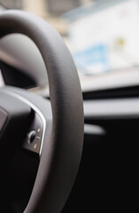 A Close-Up View of a Car's Steering Wheel