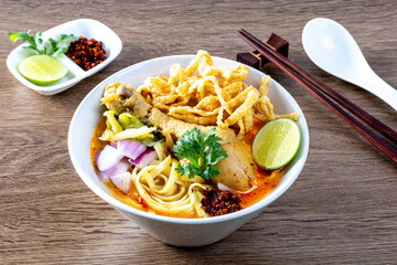 Northern Thai noodle curry soup with chicken (Kao Soi Kai) - Thai food