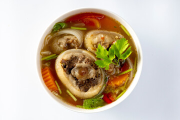 Delicious oxtail soup or buntu soup isolated on white background