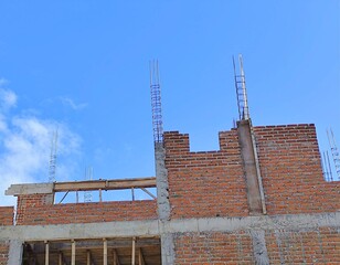 Incomplete Building Structure with Bright Sky Background