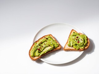 Gourmet Avocado Toast on White Plate