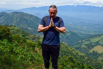 Mindful Man Practicing Gratitude in Nature – Meditation and Inner Peace on a Mountain in Colombia