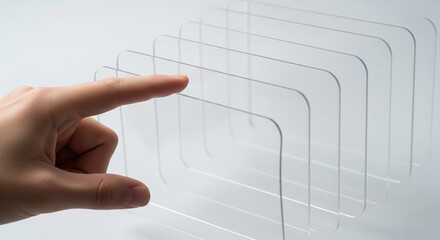 Hand touching transparent glass panels on white background for technology interface concept