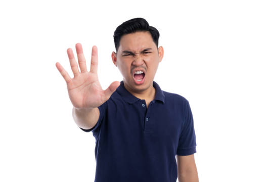 Young Asian man making a stop gesture with hand and disgusted face isolated on transparent background