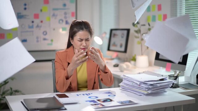 Young businesswoman getting frustrated working with documents - Powered by Adobe