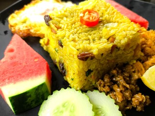 Pineapple Baked rice in plate, indoor Chiangmai Thailand.
