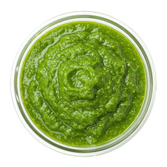 Obraz premium Freshly made green pesto sauce in a glass jar, showcasing its vibrant color and texture