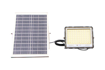 Spotlight with solar panel isolated on cut out PNG or transparent background. Solar panel small with light bulb. Saving electricity by sunlight solar energy as renewable energy clean from natural.