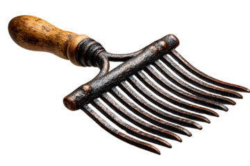 Antique flax comb with wooden handle isolated on transparent background with detailed texture