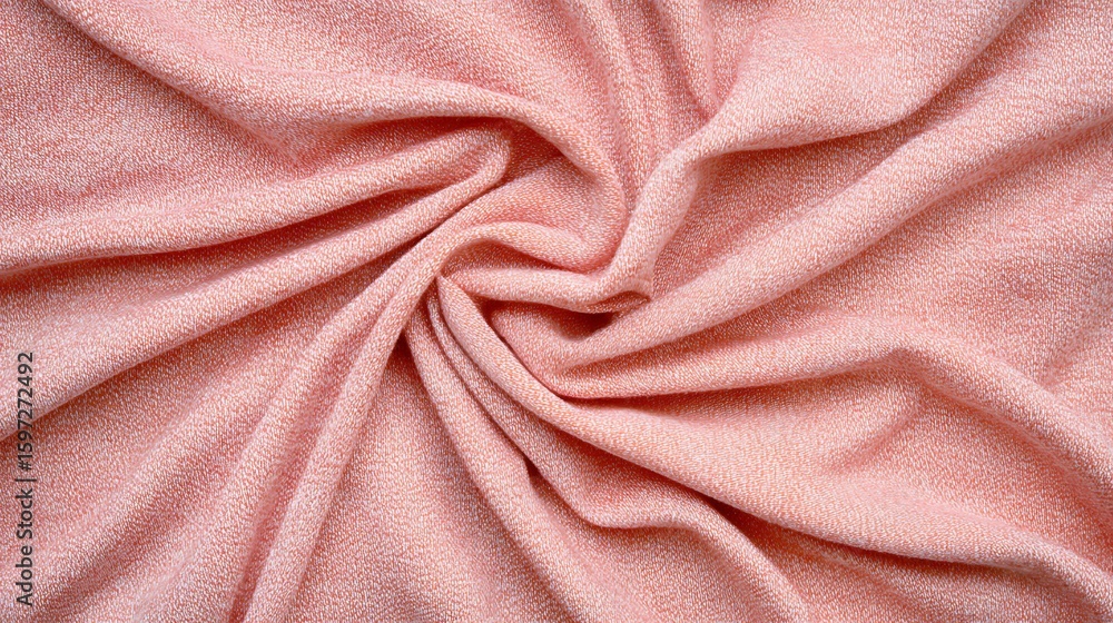 Poster soft pink fabric with a textured surface is artistically twisted in the center, creating gentle fold