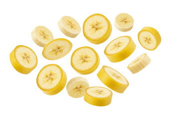 Freshly sliced bananas scattered on a white background, ideal for food photography