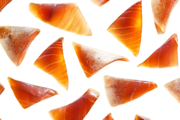 Close up of translucent orange crystal shards isolated on transparent background