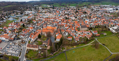  Aerial view of the old town of the city Schlüchtern on a cloudy noon in autumn in Germany.