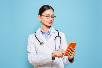 Hospital, doctor woman with phone for research, reading news or medical information. Clinic, neurologist or texting on mobile app technology for social media, patient record or telehealth