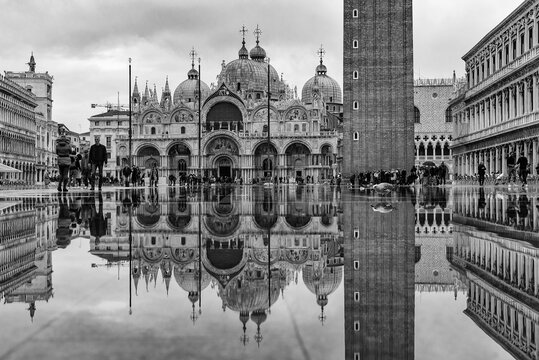 The reflection of St Mark's Basilica and Campanile at St Mark's Square (Piazza San Marco), Venice, Italy (black & white)