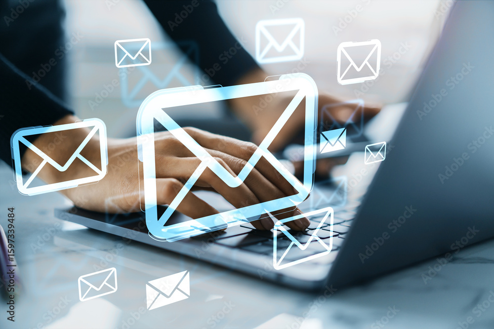 Poster hands typing on laptop with floating digital email icons symbolizing online communication and cloud-