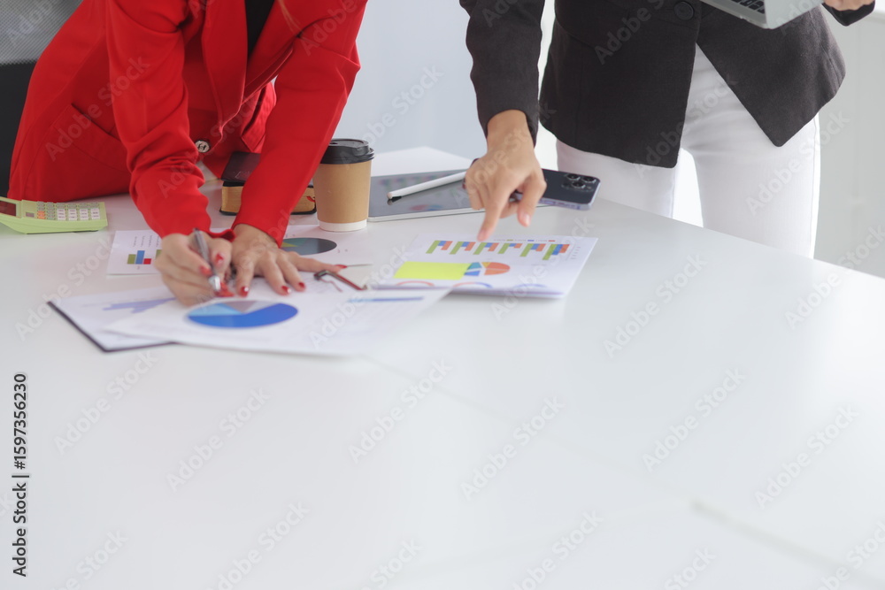 Poster teamwork of business people brainstorming with financial data graph analysis on the table in the mee