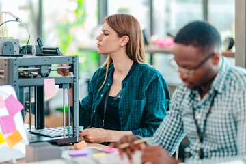Diverse Startup Team Working on 3D Printing Project