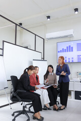 business people discussing work together and analysis data in a meeting room,