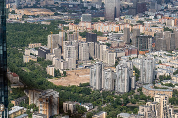 Cityscape of Moscow Showcasing Modern Buildings and Greenery From an Elevated Perspective in Bright Daylight