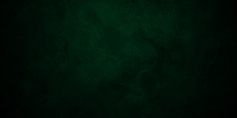 Dark green background with grunge backdrop texture, watercolor painted mottled background, bright ink black and green textures paper background.	
