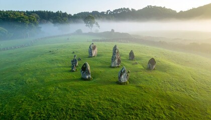 Ancient stones embrace a misty morning glow