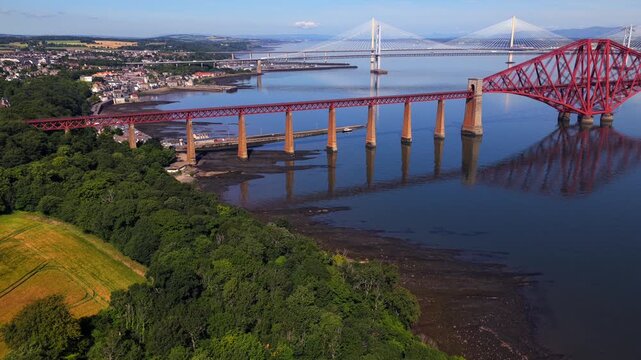 Aerial video of the south side of Forth Bridge in Edinburgh- Scotland. 
