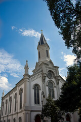 Catholic church with a blue sky and clouds in Savannah, Georgia
