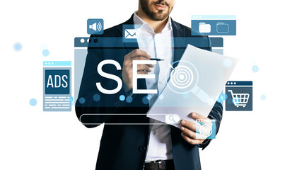Businessman holding paper and pen with SEO and marketing icons overlayed, modern digital style, isolated white background, business concept