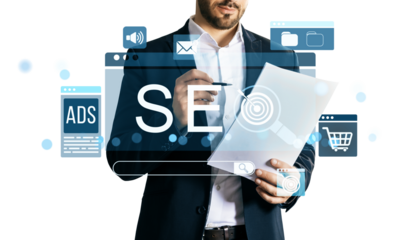 Businessman holding paper and pen with SEO and marketing icons overlayed, modern digital style, isolated white background, business concept