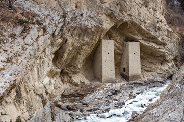 Ancient Watchtowers in Argun Gorge with Scenic River