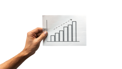 Hand holding a paper showing a financial growth chart with an arrow, symbolizing business success and market progress