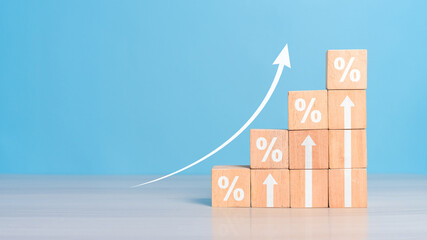 Interest rate financial and mortgage rates concept. Wooden blocks with Icon percentage symbol and...