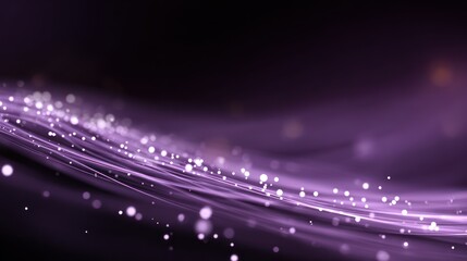 Abstract purple design with sparkling particles.