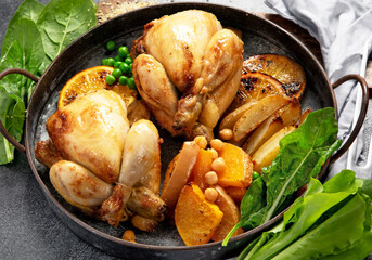 Roasted golden baked cooked whole chicken.