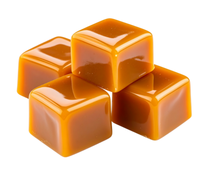 Four caramel cubes isolated on transparent background