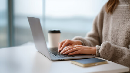 Fototapeta premium Remote work or freelance lifestyle with a person working on a computer