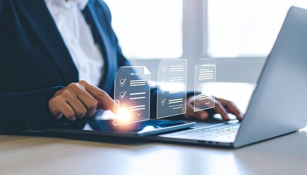 Business person reviewing digital documents on laptop with interactive checklist overlays