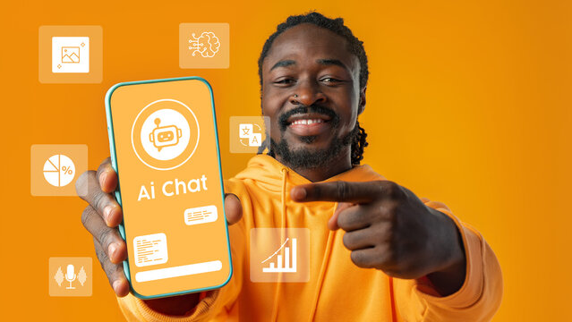 Smiling man showcasing an AI chat application on a smartphone against a vibrant orange background