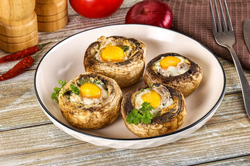 Baked champignon with quail egg