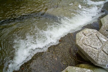 River water flowing down the steps and water bubbles