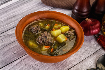 Soup with beef meatballs and vegetables