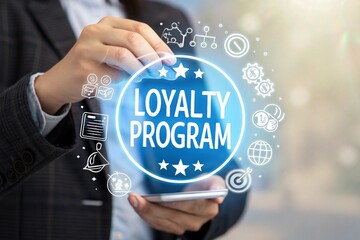 Businessperson interacting with a glowing loyalty program interface on a smartphone