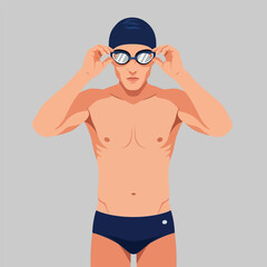 Athletic Man Wearing Swimming Cap and Goggles in Studio Portrait