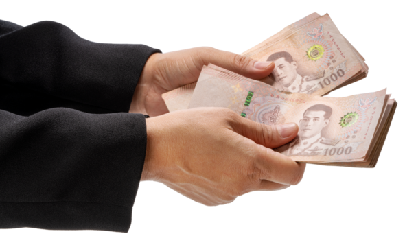 Hand holding a stack of Thai baht banknotes isolated on white with clipping path , concept of payment, corruption, or financial transaction