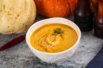 Pumpkin cream soup with prawns