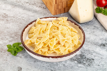 Italian pasta Farfalle with oil