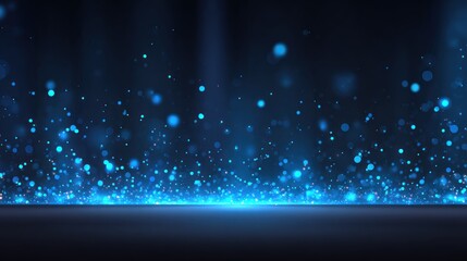 Sparkling, blue light particles on a dark surface.