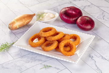 Golden fried onion rings snack